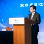 Commissioner Kim addressing the delegates